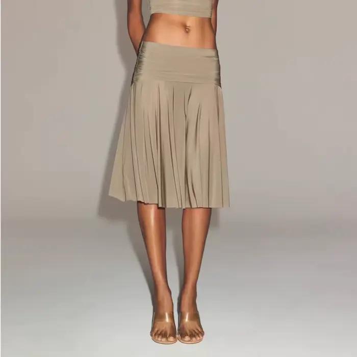 Jupe plissée taille moyenne pour femmes, tenue élégante, couleur unie, mi-longue, douce et romantique, au-dessus du genou, printemps-automne