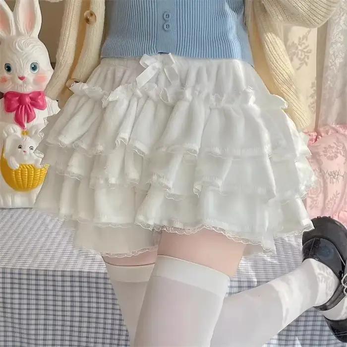 Nouveau rose japonais Kawaii Lolita jupe femmes nœud laine chaud doux Mini gâteau