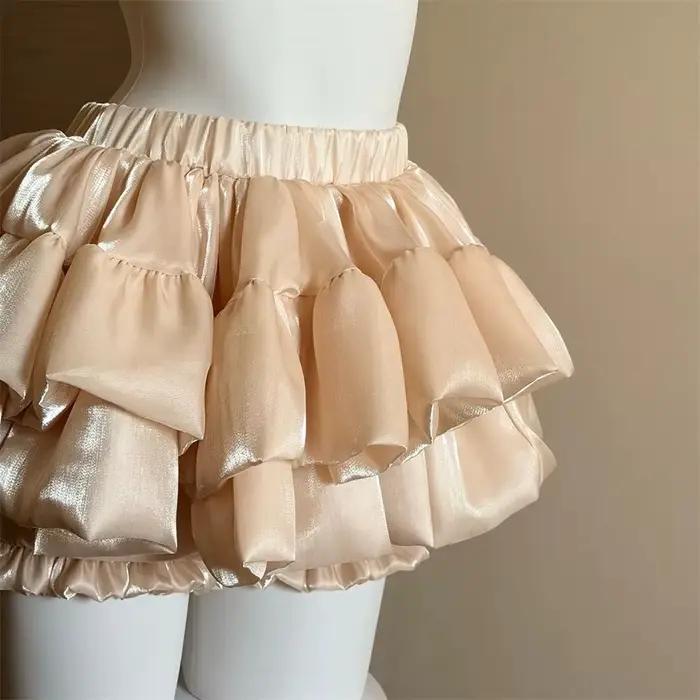 Jupe courte décontractée en satin doux à taille élastique pour femme, jupe d'été chic blanche à volants superposés, jupe de princesse élégante et tendance pour femme occassions spéciales