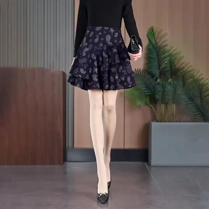 Mode imprimé épissé à volants a-ligne jupes vêtements pour femmes 2025 été nouveau bureau ample dame fermeture éclair