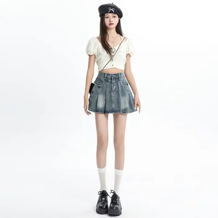 Jupe courte plissée en jean bleu taille haute pour femme