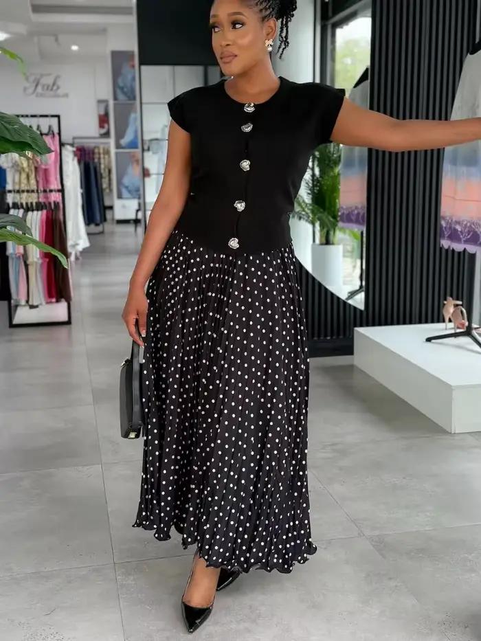 Jupe midi plissée élégante à pois unis pour femme