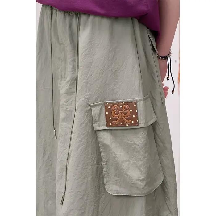 ELFSACK Jupe cargo mi-longue streetwear avec détails patchwork pour femme, jupe d'été Kawaii avec taille à cordon, tenue cool style Harajuku