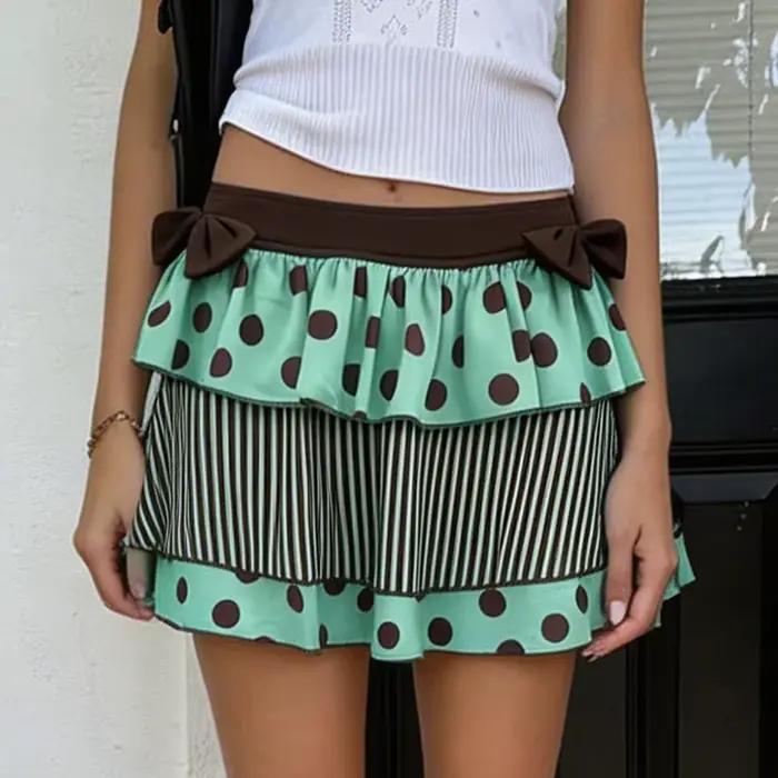 Jupe courte évasée à pois avec nœud créatif style décontracté mode vintage street spice femme occasions spéciales