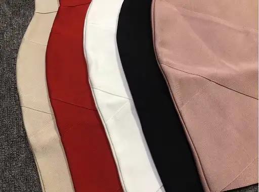 Jupe à bandes taille haute moulante mini jupe asymétrique élastique pour soirées boîte de nuit et sorties élégantes