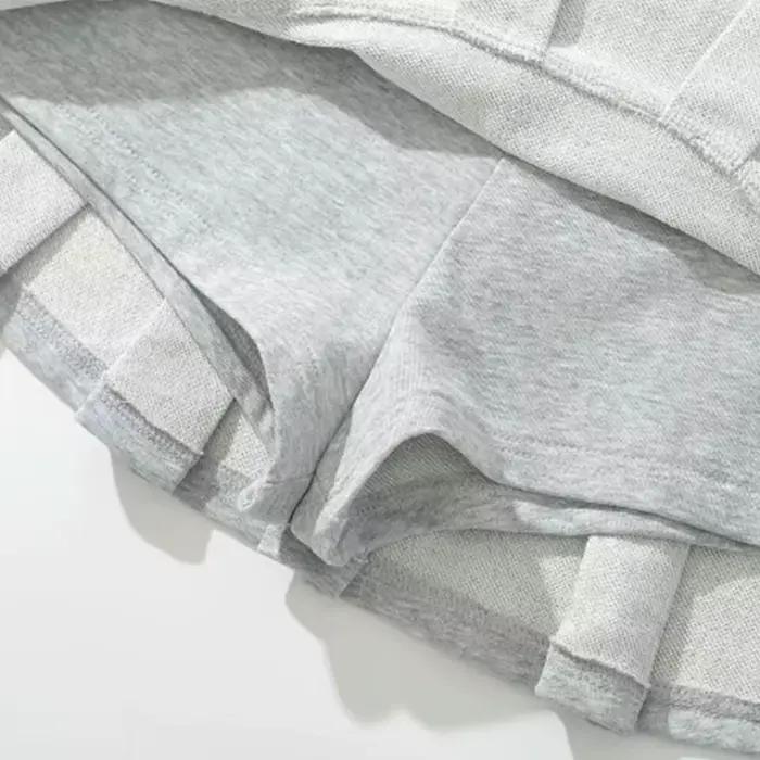 Mooyufon tissu Y2K Mini jupe femmes taille basse large plissé gris clair Sexy Vintage a-ligne