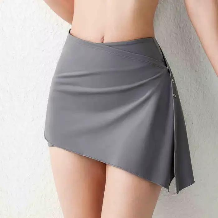 Ensemble de jupe de hanche à rideau de fesses personnalisé Pilates pour femmes; pantalons de yoga de fitness de sport anti-embarras à la mode pour le printemps a