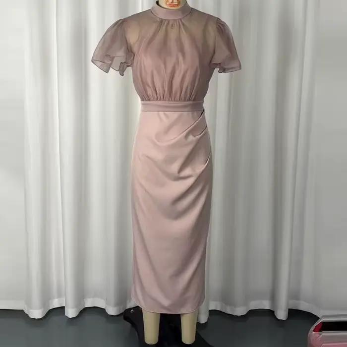 Ensemble élégant jupe moulante et haut en maille transparente pour femme – Collection été couleur unie, coupe ajustée, idéal pour le quotidien