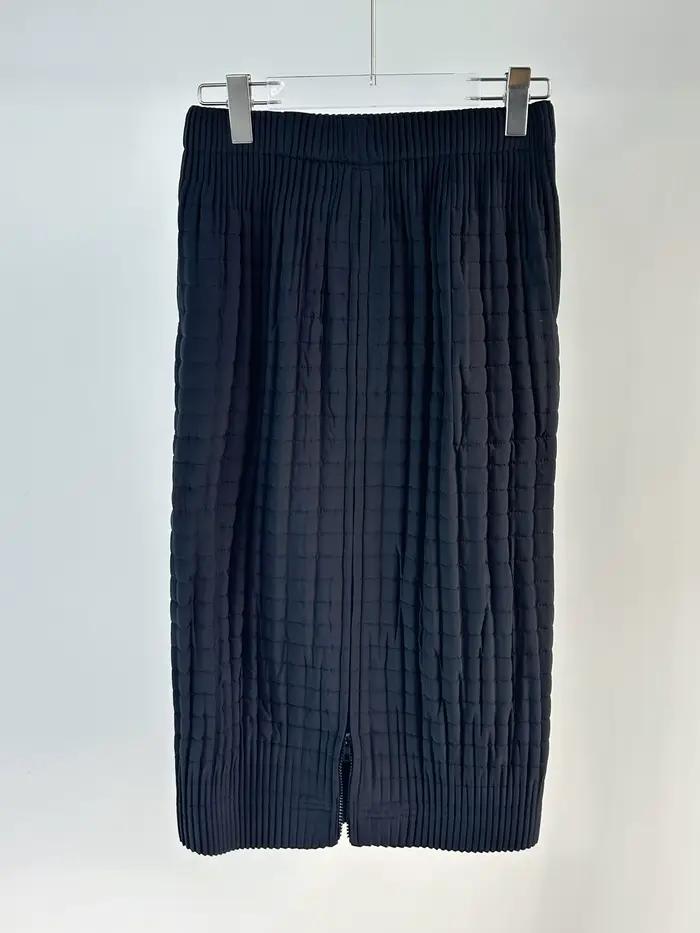 Ensemble manteau et jupe plissée noir et blanc