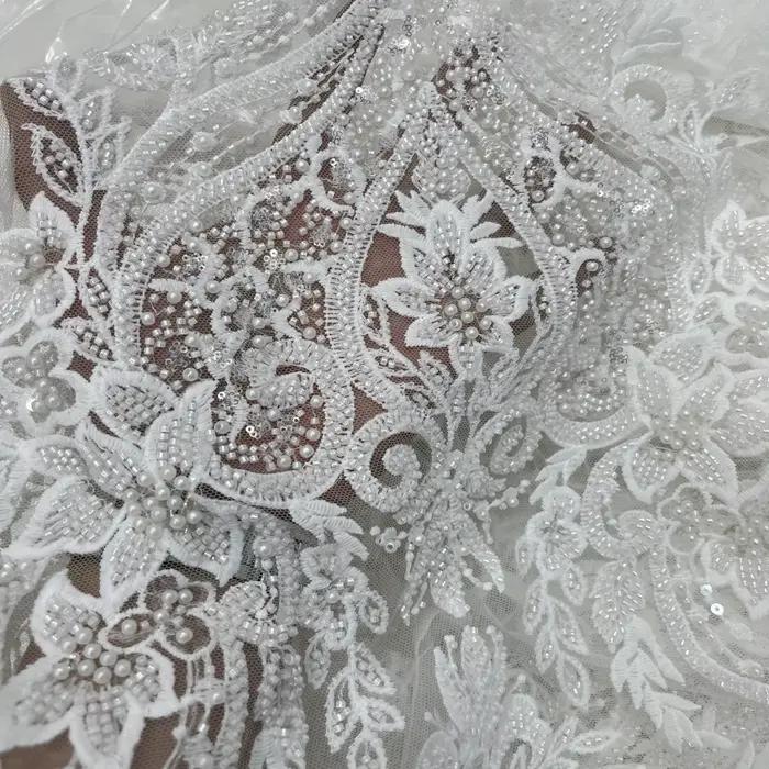 Robe de mariée haut de gamme unique et luxueuse de style palais, broderie en dentelle perlée, tissu brodé