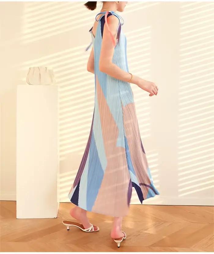 Robes longues robes de soirée sangle Xia Xin imprimé ourlet en forme de A fendu col en v robe ample sans manches ruban longue jupe féerique