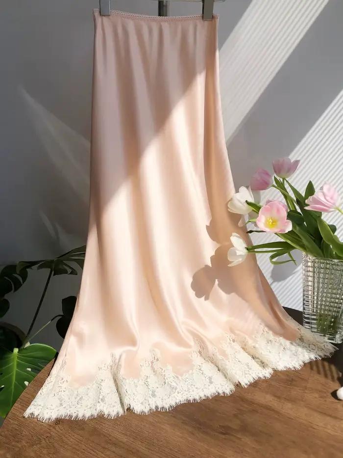 Jupe longue élégante en soie avec dentelle florale creuse noire et blanche