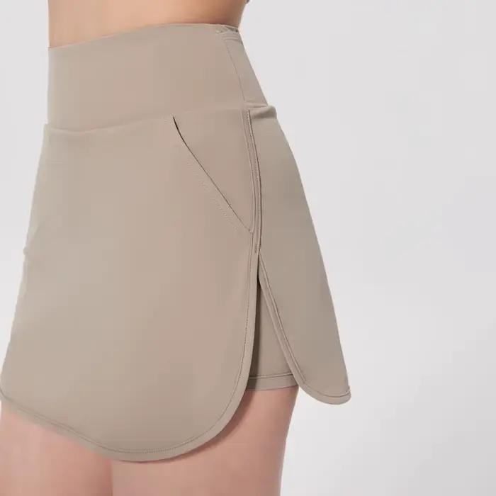 Jupe de tennis antireflet avec short intérieur pour femme
