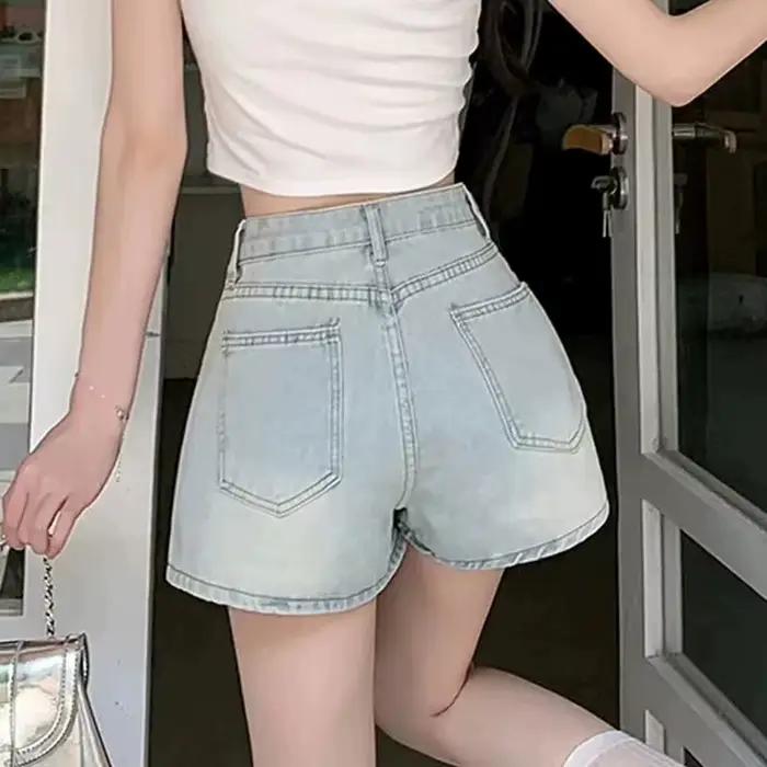 Mode noeud papillon a-ligne Denim jupes femmes coréen asymétrique fendu bleu jupe dames été nouveau basique taille haute
