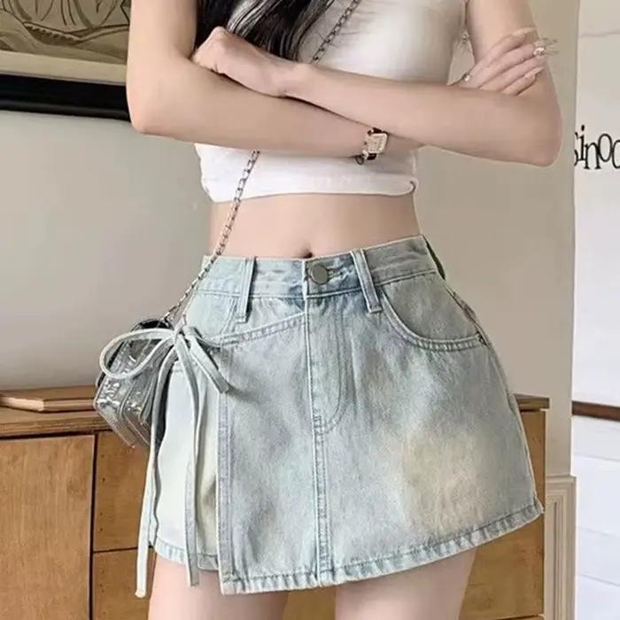 Mode noeud papillon a-ligne Denim jupes femmes coréen asymétrique fendu bleu jupe dames été nouveau basique taille haute