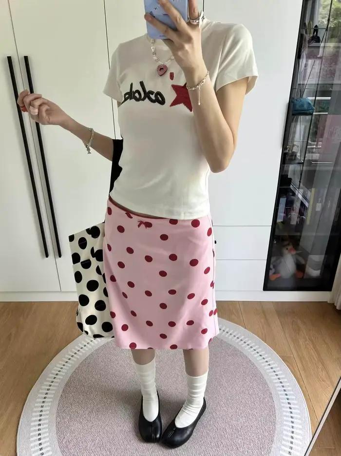 Jupe mi-longue tube droite à pois rose style rétro américain pour femme