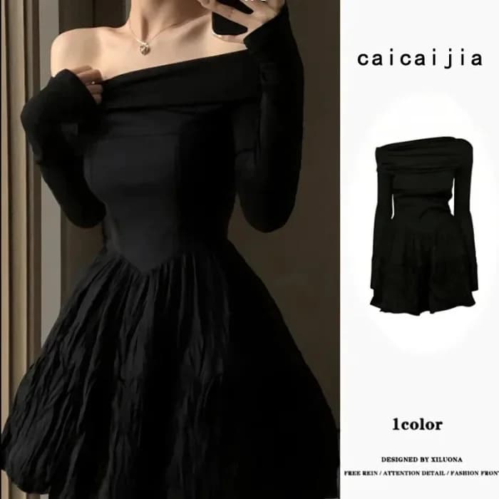 Robe noire trapèze à nœuds aux épaules, manches longues, design jupe courte amincissante, mode fémin