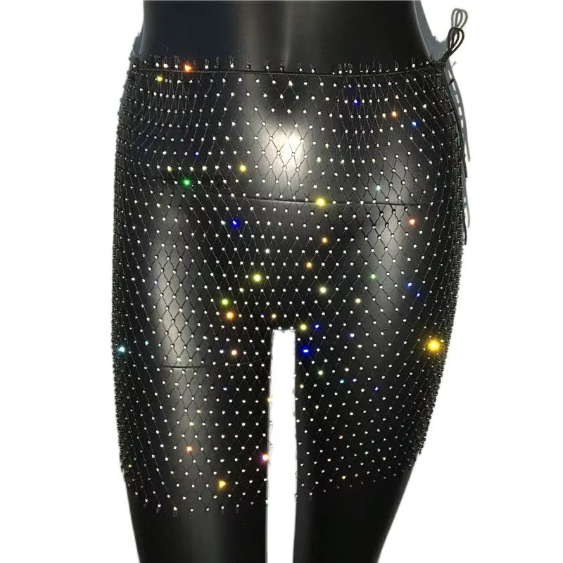 Mini jupe en résille blanche et noire pour femmes, strass scintillants, moulante, ajourée, transpare