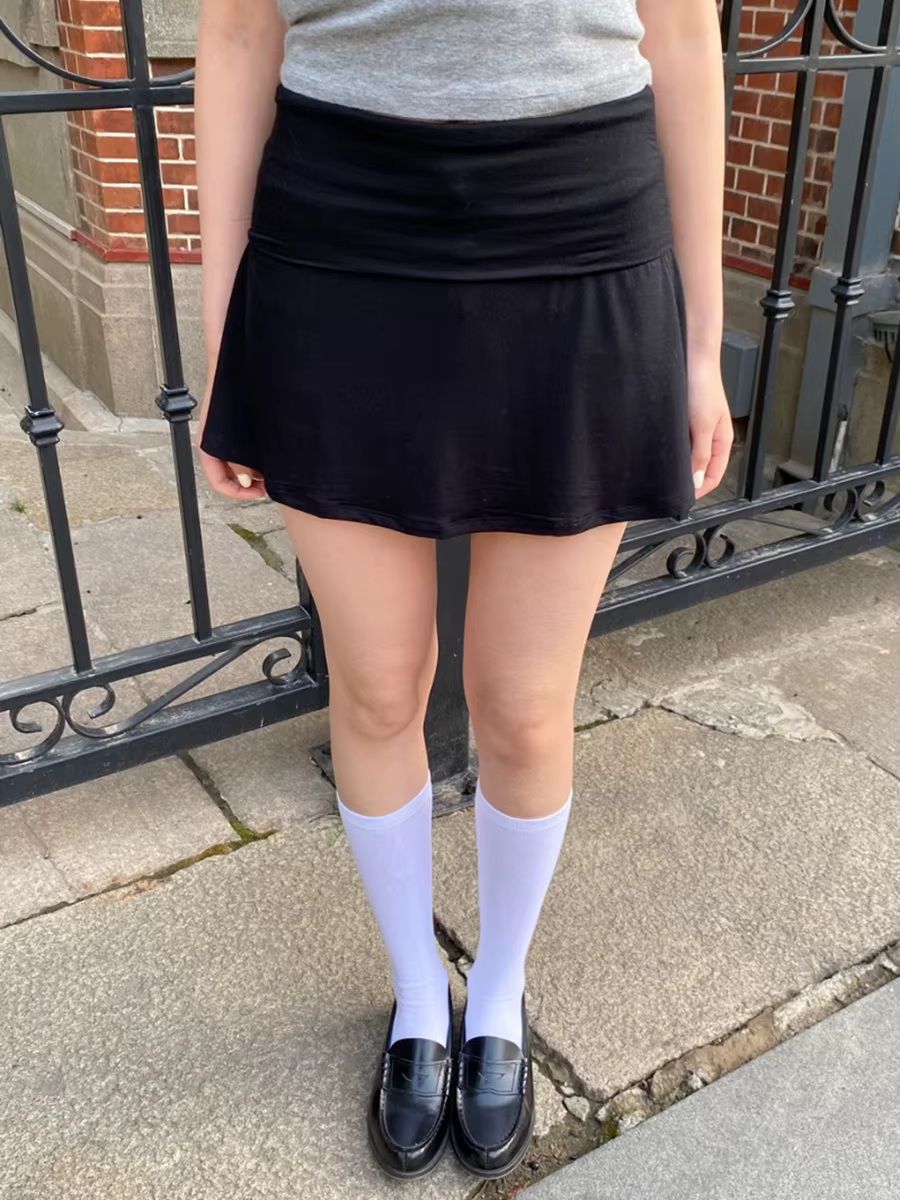 Mini-jupes noires plissées pour femme, taille basse élastique, coupe trapèze, style preppy, décontra
