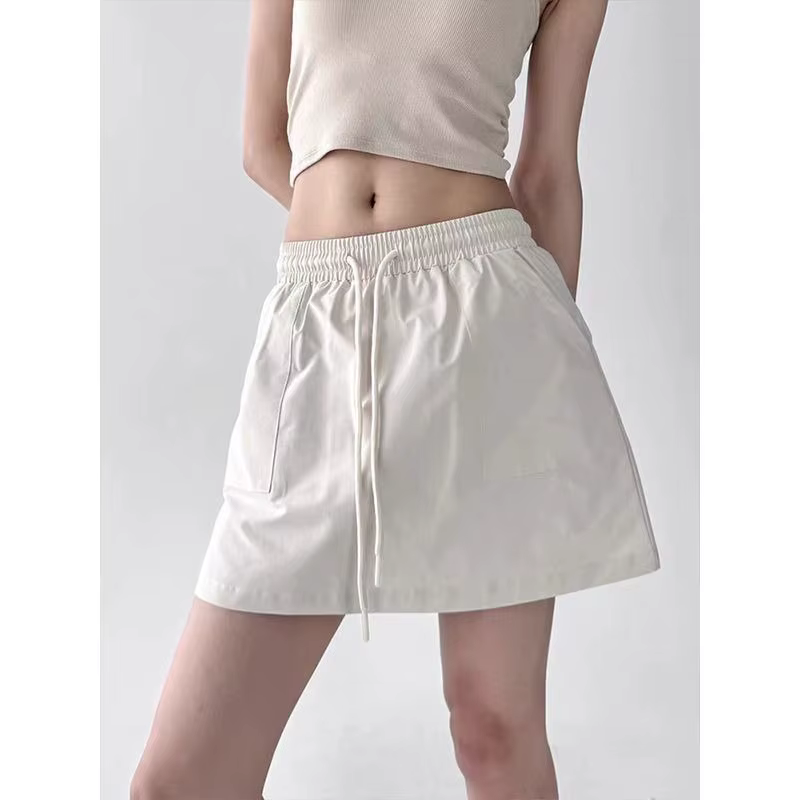 Jupe courte de style sportif pour femmes, jupe à taille haute pour le printemps et l'été, jupe court