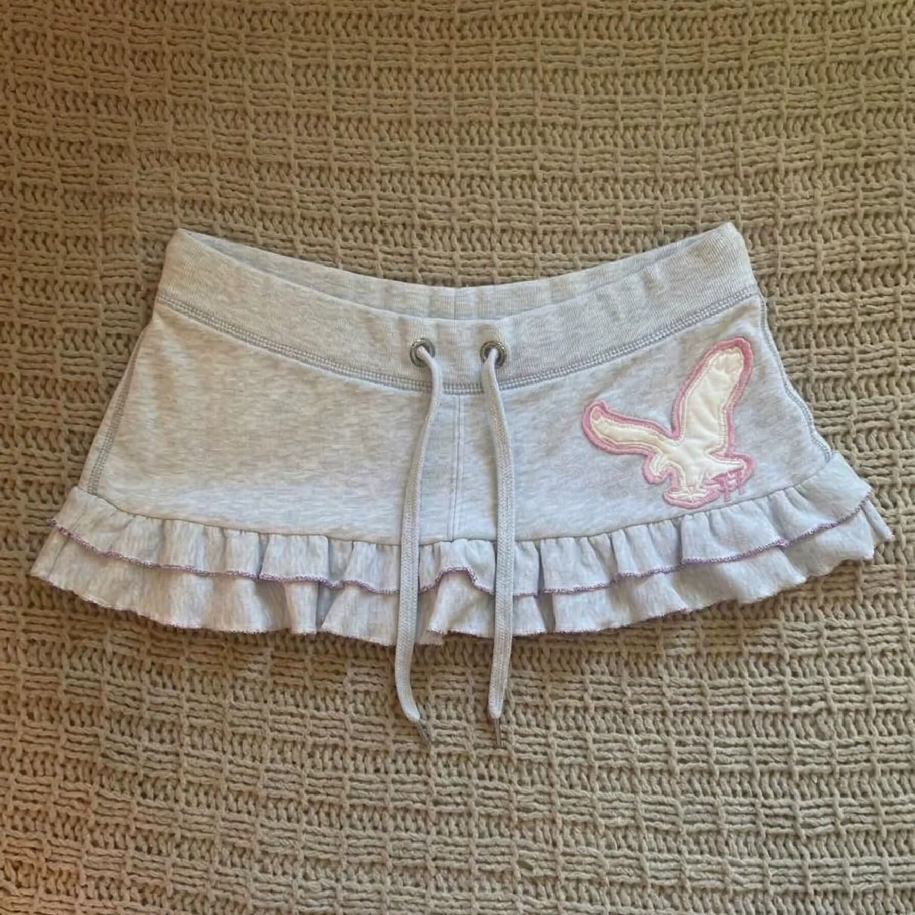 Kimotimo Mini-jupe grise à volants style rétro américain pour femme, esthétique Y2K, taille basse, c