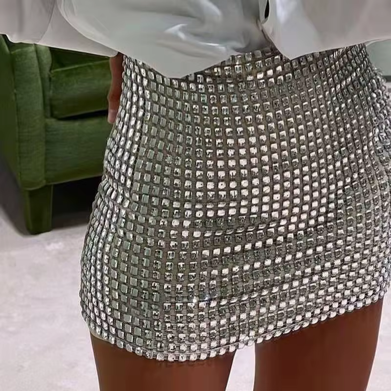 Été femmes paillettes mince a-ligne jupe dames Wrap hanche solide argent maille jupe femme décontrac