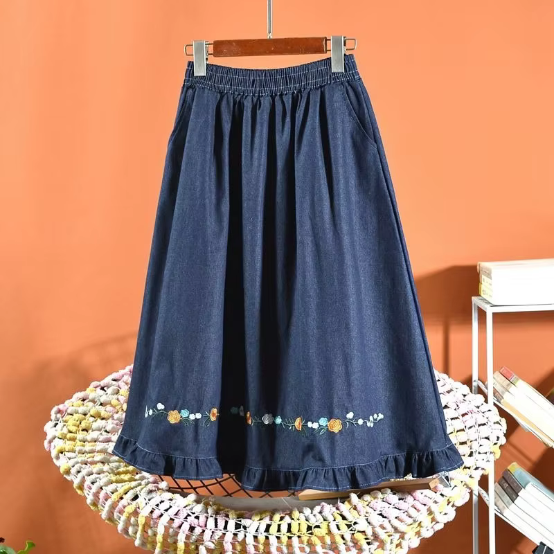 Jupe midi évasée à taille élastique en jean bleu doux brodé, coupe ample, polyvalente et décontracté