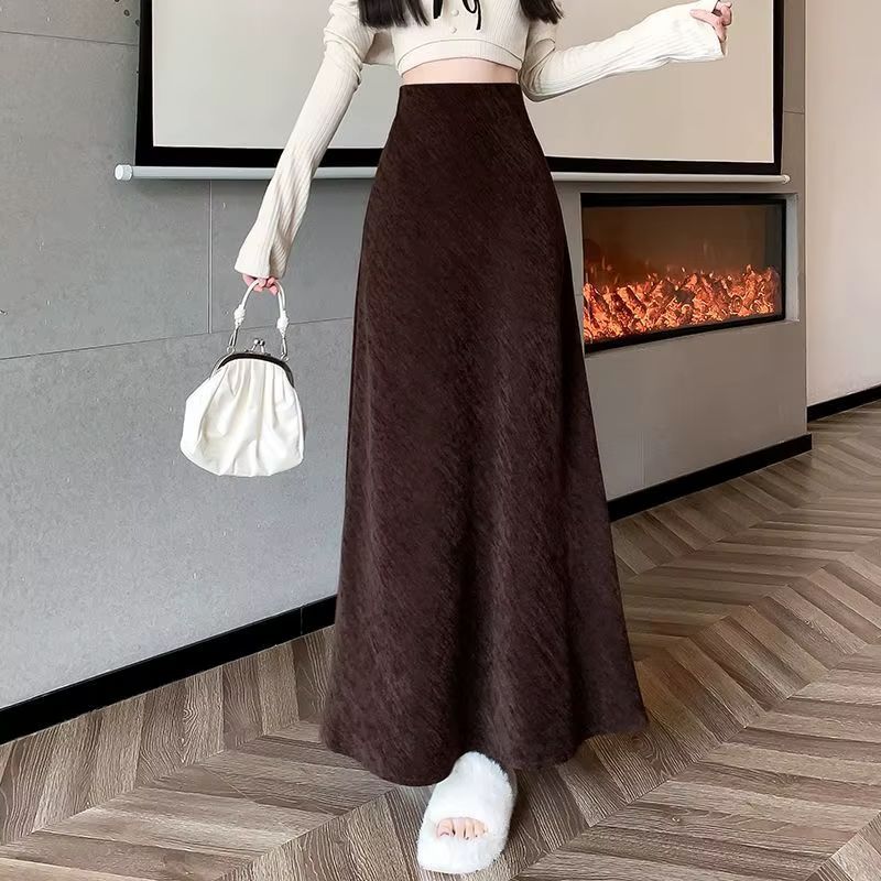 Demi-jupe trapèze noire taille haute, nouveau style 2025, jupe queue de poisson amincissante, jupe mi-longue d'automne et d'hiver