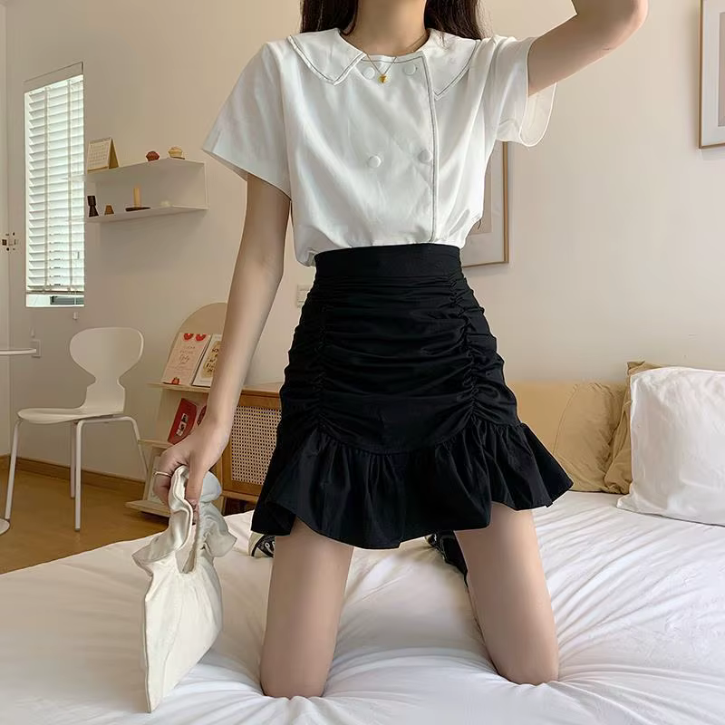 Jupe courte plissée taille haute polyvalente pour femme