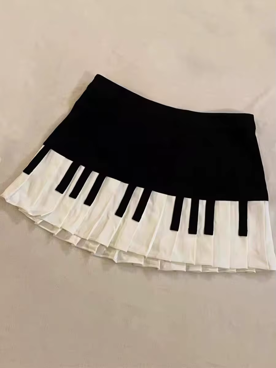 Jupe courte épissée noire et blanche pour femmes, design slim, Harajuku chic, jupe de piano rétro plissée, midi, kawaii, 2025 y2k polyester plissé avec appliques pour bureau et occasions sociales