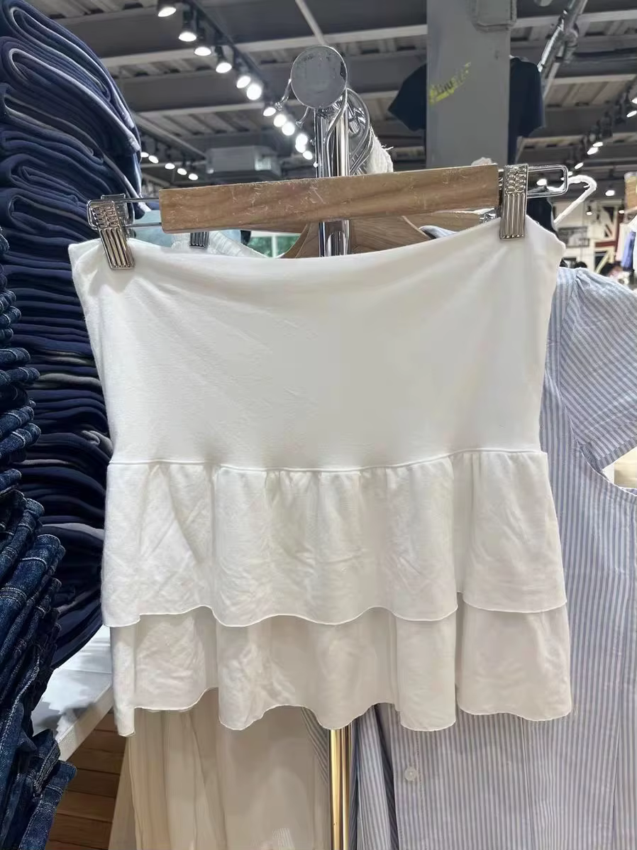 Mini-jupes blanches à volants étagés pour femmes