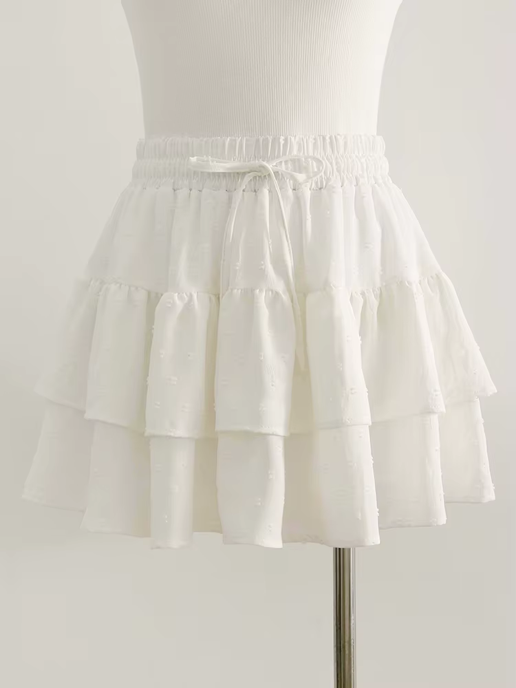 Streamgirl femmes Mini jupes avec Short sous les vêtements d'été cravate une ligne courte blanche plissée à volants