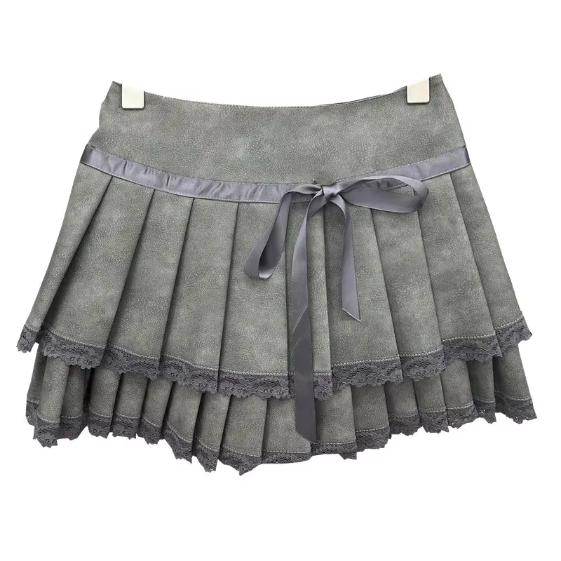 Mini-jupe plissée en similicuir à bordure dentelle pour femme