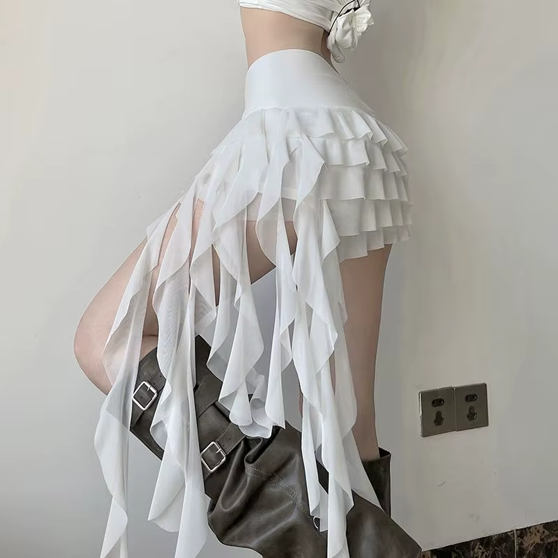 Jupe courte asymétrique à volants en maille transparente pour femme