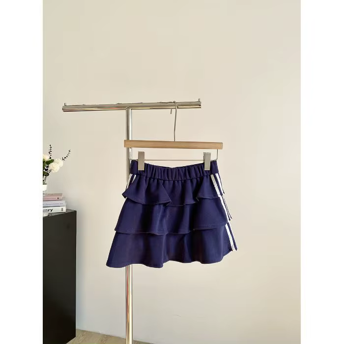 Jupe courte rayée douce polyester été 2026 anti-exposition bouffante ajustement parfait femmes occasions spéciales