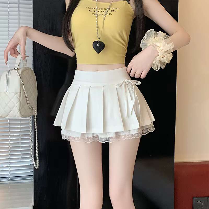 Jupe-short plissée avec dentelle intégrée mini-jupe taille haute élégante avec nœud et fente pour femmes occasions spéciales été printemps